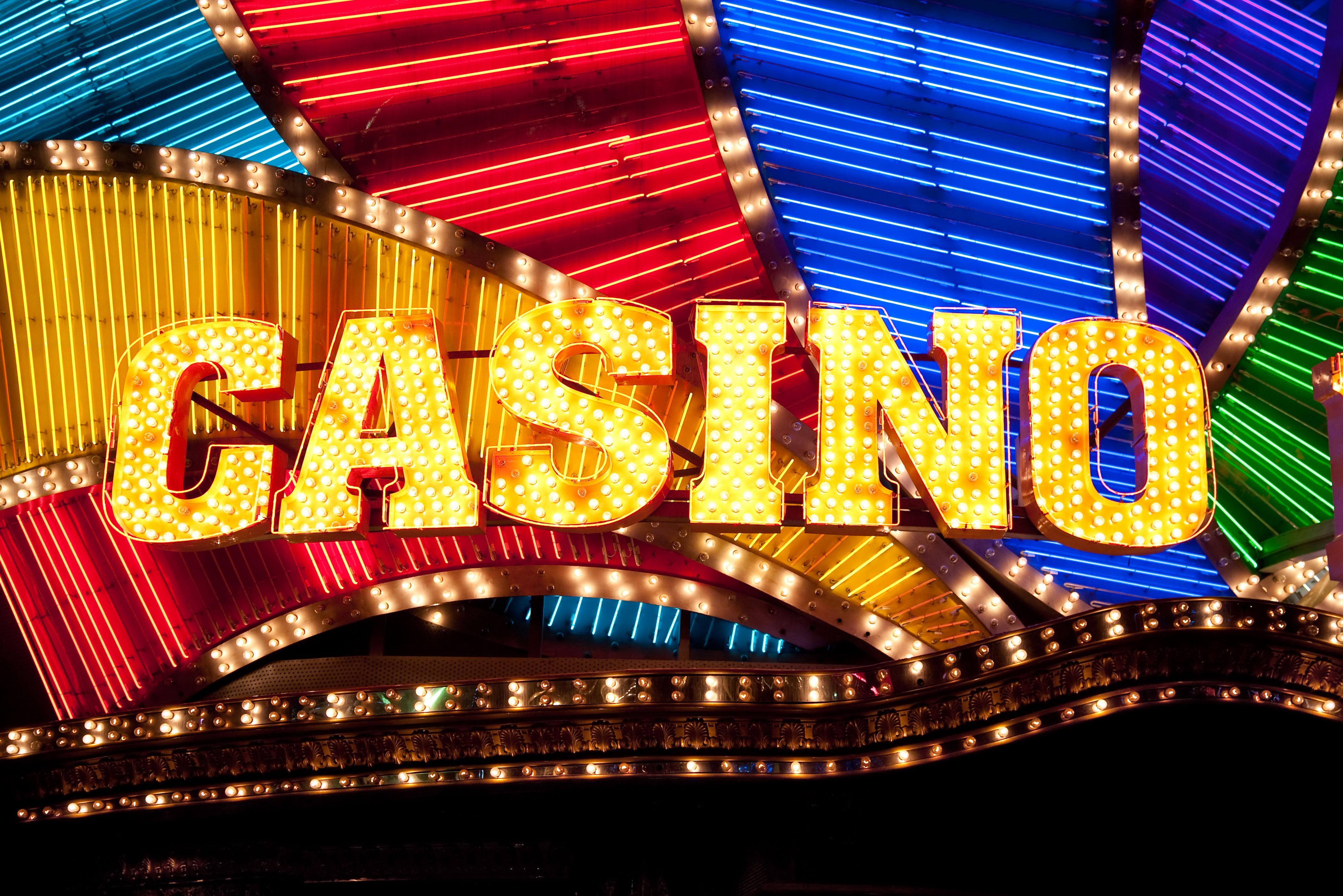 A neon-themed graphic with the Slots of Vegas logo and text 'Bonus Codes'.